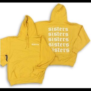 James Charles yellow Sisters sweatshirt